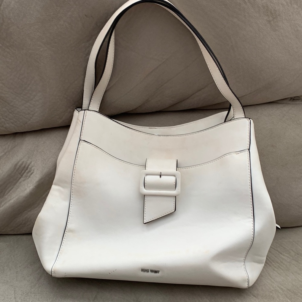 Off white Nine West purse with front snap closure on buckle